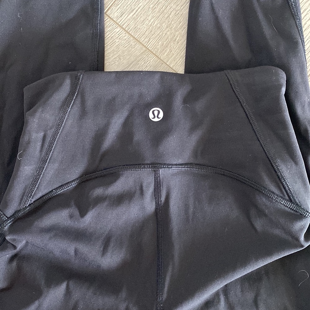 lululemon black full-length leggings with mesh on sides. size 2.